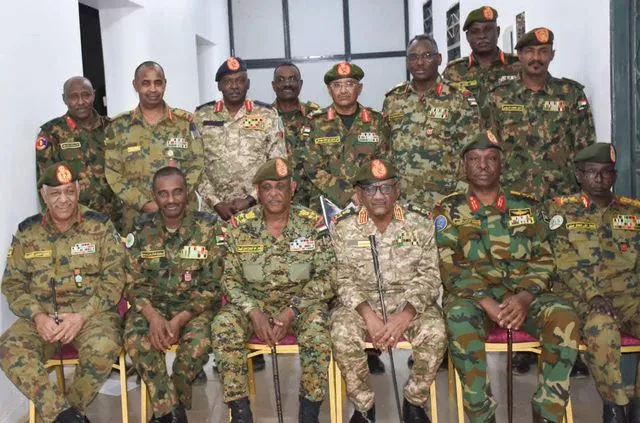 A member of sovereignty, deputy chief, lieutenant -general Yasser, Al -atta, meets the chief of staff